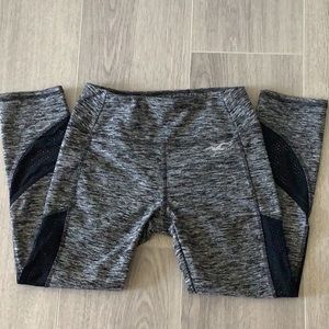 Woman capri leggings with mesh on the side and at the calf areas.